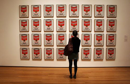 32 of Andy Warhol's soup and one spectator